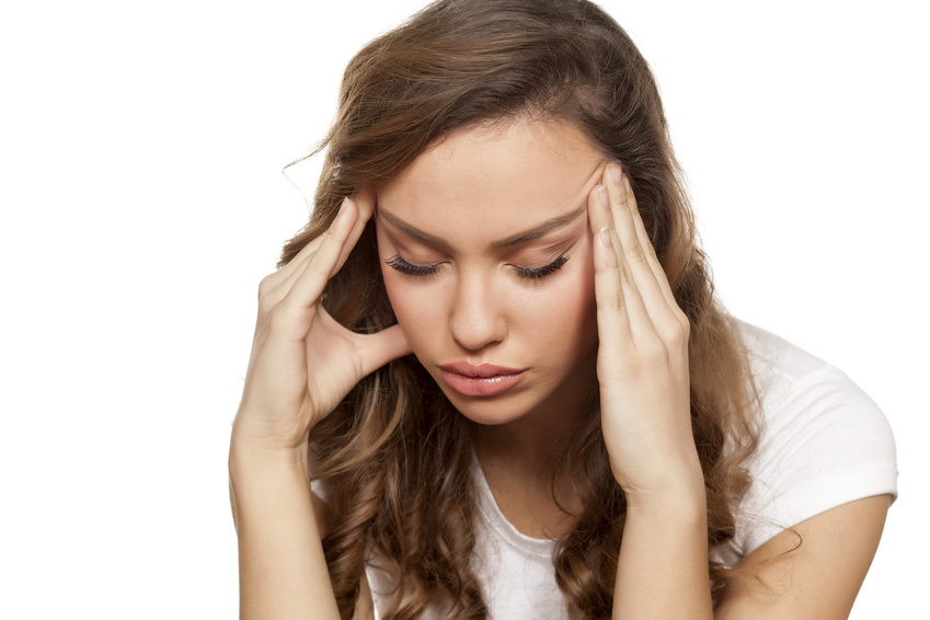 Girl finding ways to reduce headaches